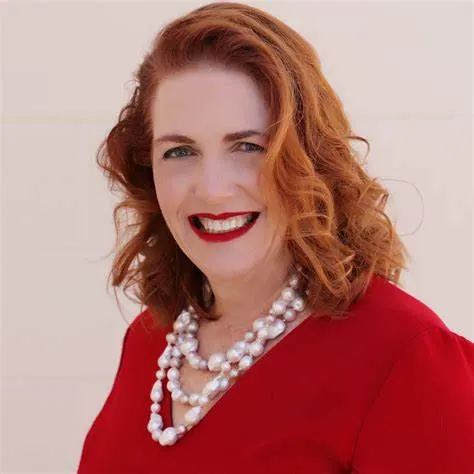 Louise Bloomfield in a red dress, portrait